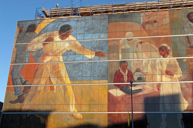 The curtain wall of the hospital's new patient pavilion boasts a blow of the hospital's famous WPA murals